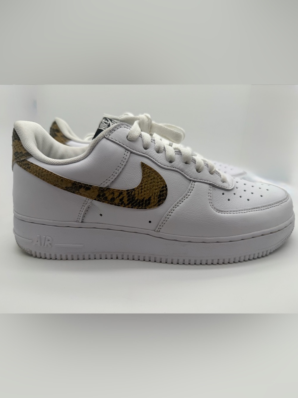 Nike Air Force 1 low retro White Sneakers with Brown Snake-Print Swoosh